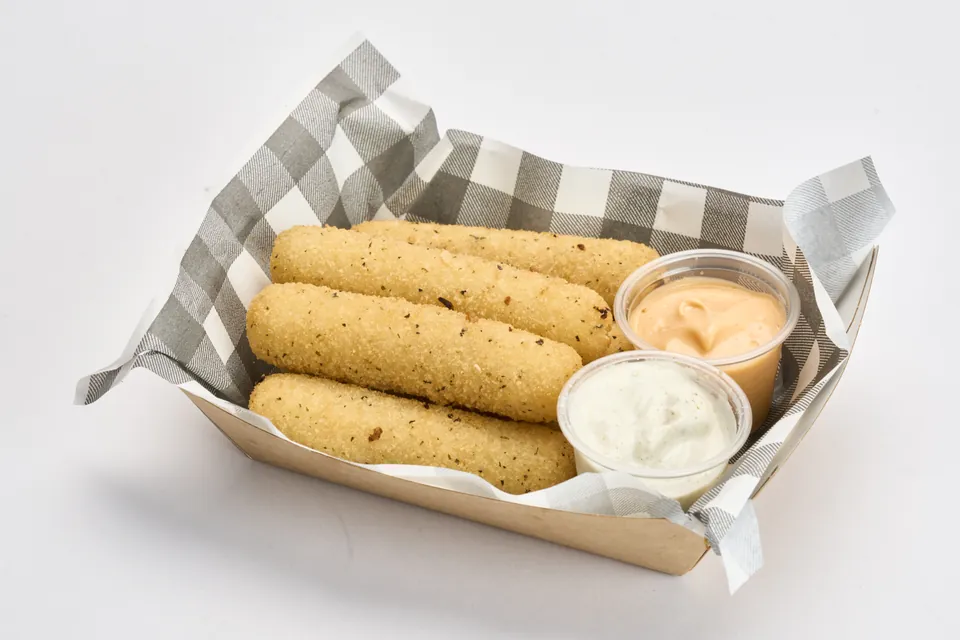 Herb-crumbed mozzarella sticks with dipping sauces